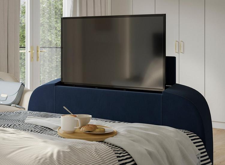 Navy velvet-touch bed frame, showing the foot end with built-in TV and breakfast tray