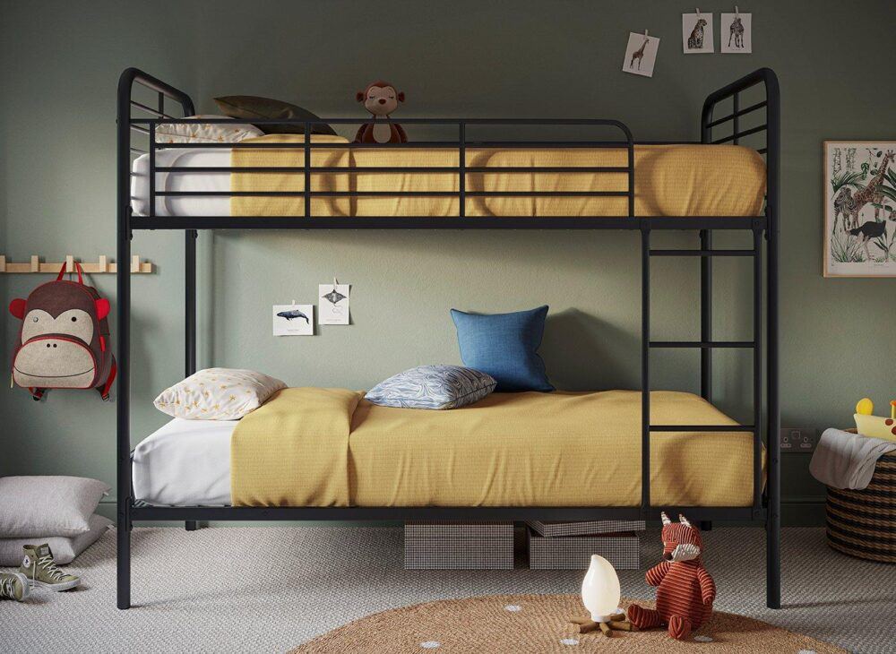 A kids black metal bunk bed, styled in an earthy green kids room with natural decor.