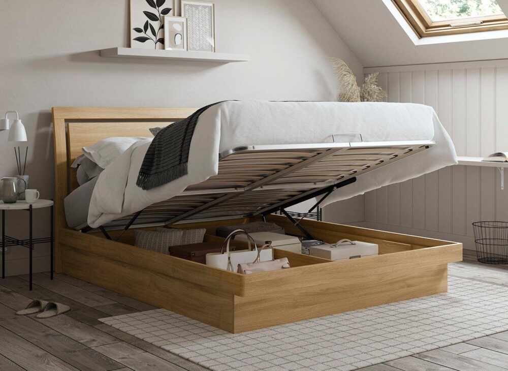 Isabella Platform Bed in light wood, lifted to showcase storage