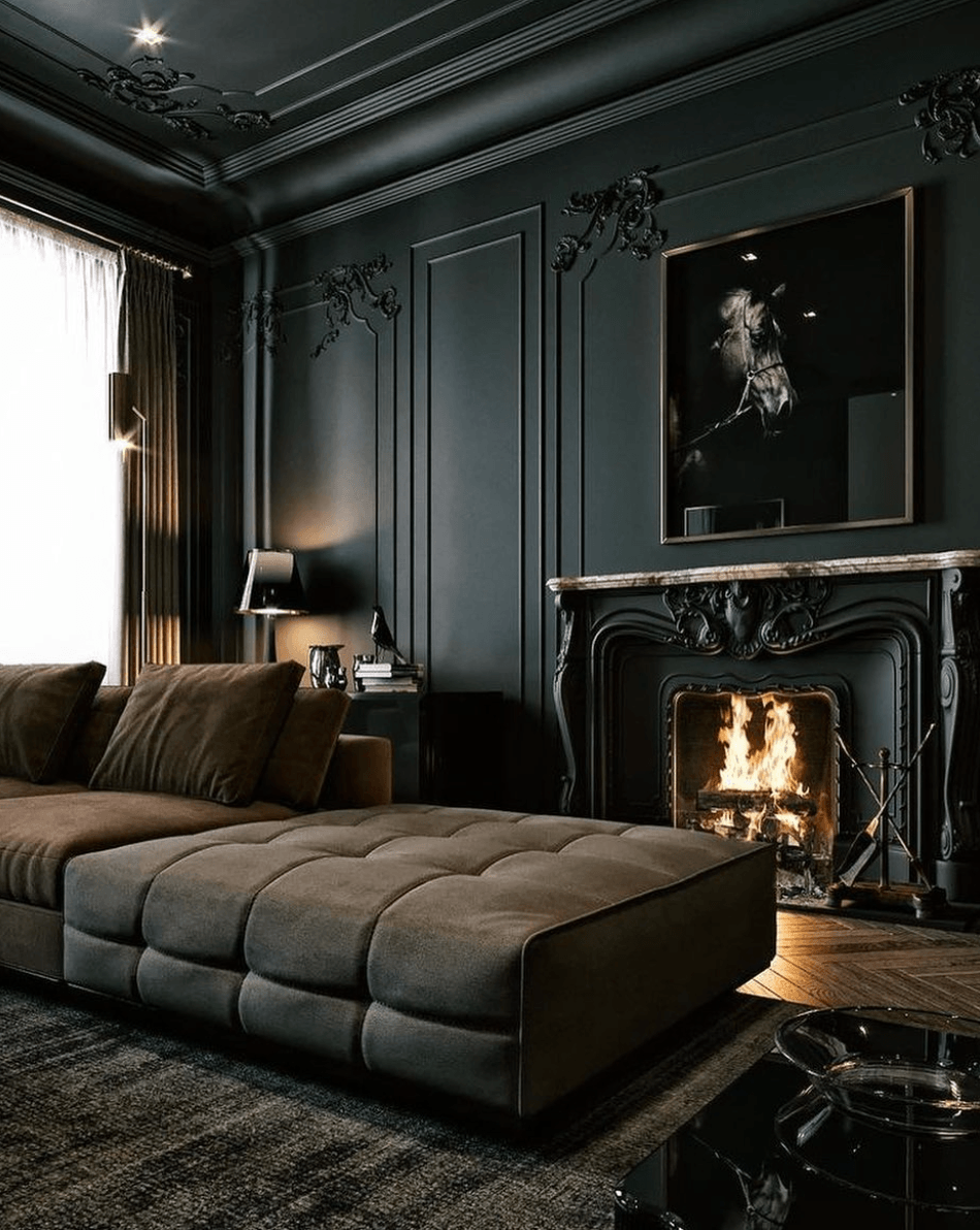 Dark and moody tone on tone black and navy room