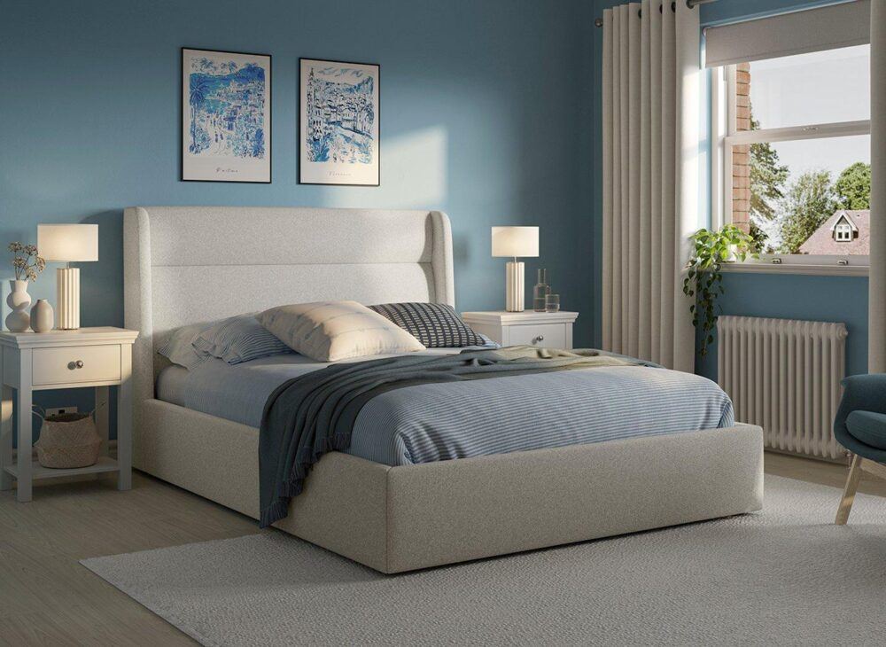 Marcello Upholstered Ottoman Bed Frame in white with blue and white decor