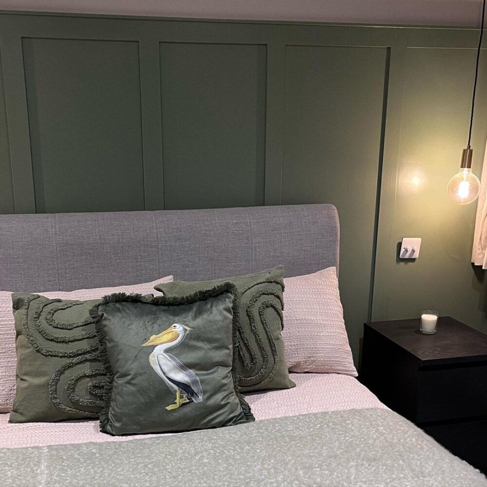 UGC by @renoatno24_ featuring grey bed and green panelled walls