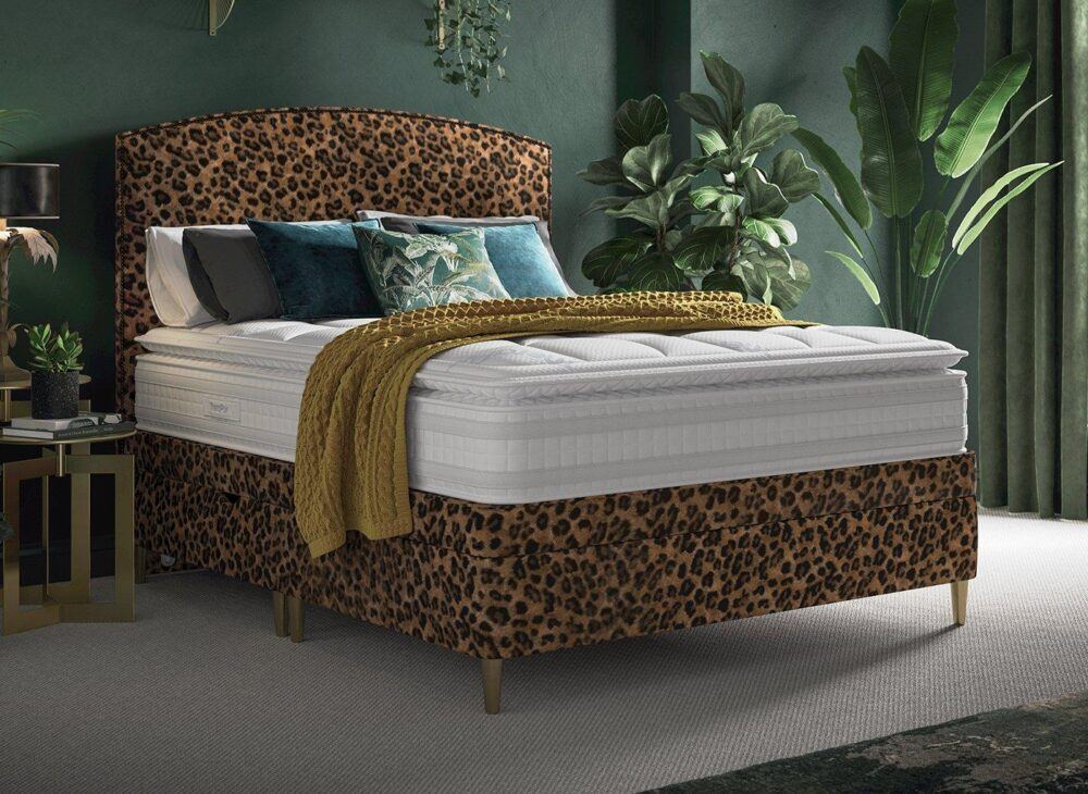 TheraPur® Shallow Ottoman Divan Bed Base and Headboard in leopard print with dark green decor