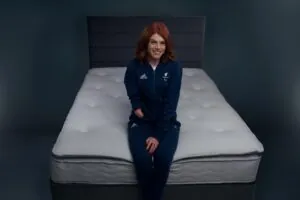 Lauren Steadman MBE, ParalympicsGB triathlete, sat on a Dreams mattress