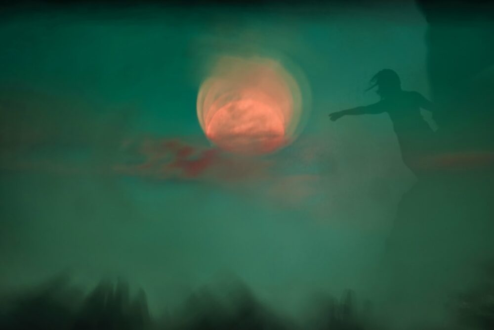 An abstract, blurry image of a person reaching out to an orange moon against a green sky